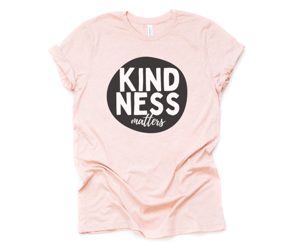 Kindness Matters T-shirt DTG printed on a Heather Prism Peach Bella + Canvas T-shirt